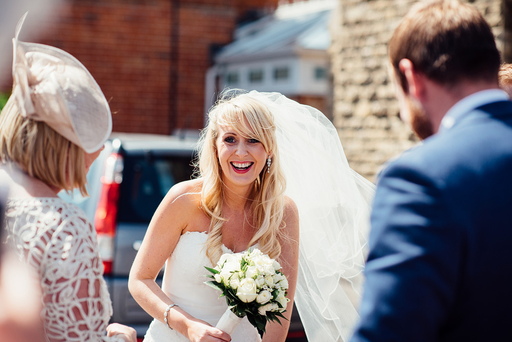 Caswel House Wedding Photography Bride smiling at camera, outside