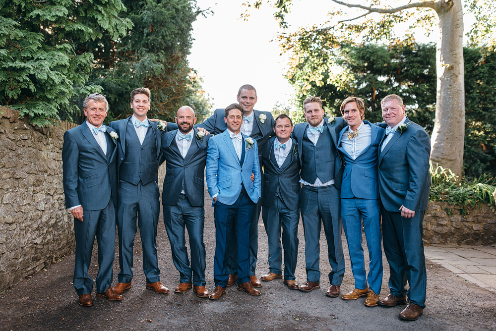 Bristol whimsical wedding. Groom and men in blue.