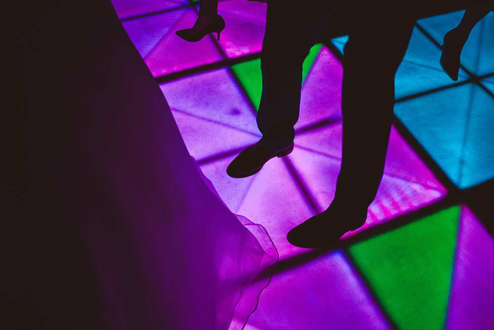 purple dancefloor at wedding