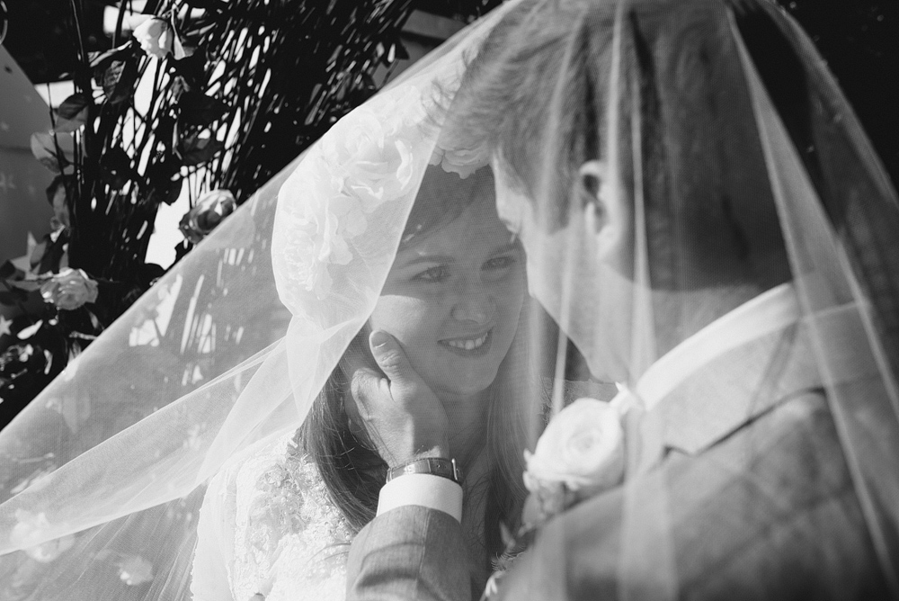 Bristol whimsical wedding bride and groom under the veil