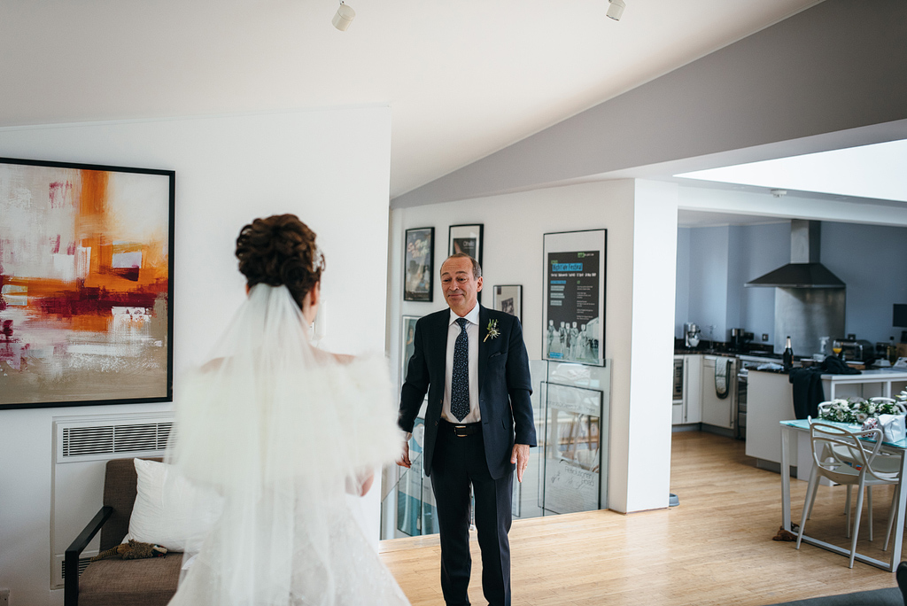 Father seeing bride in dress