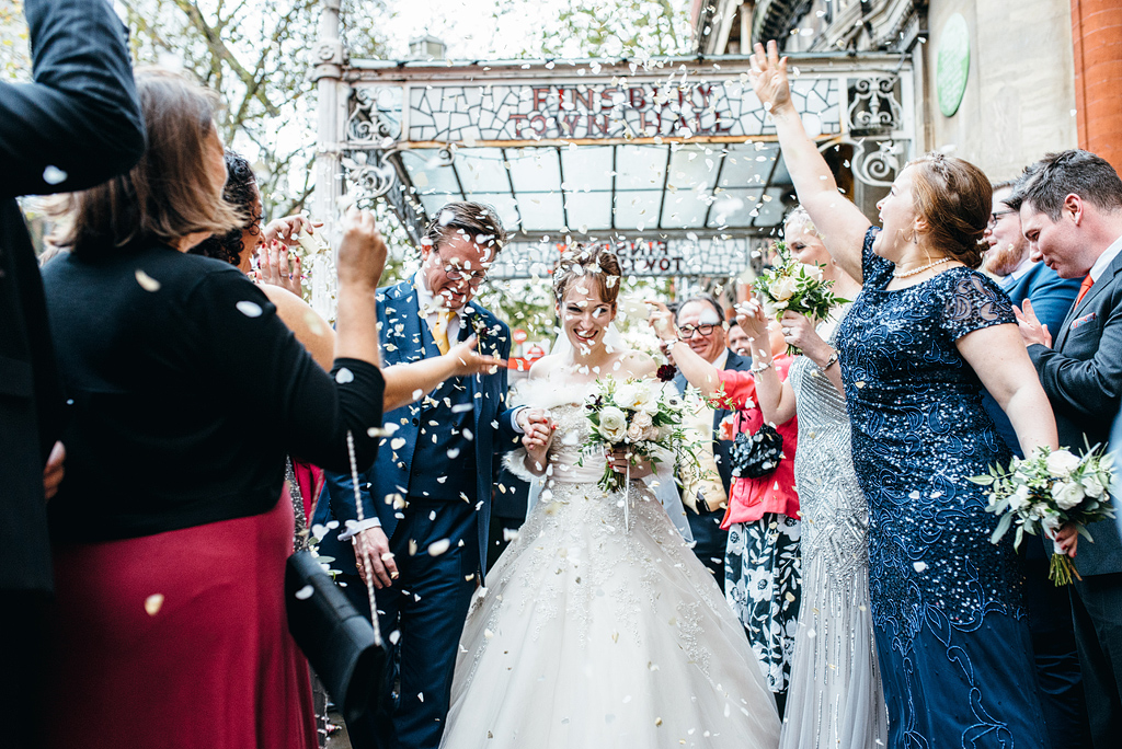 Confetti thrown over bride and groom