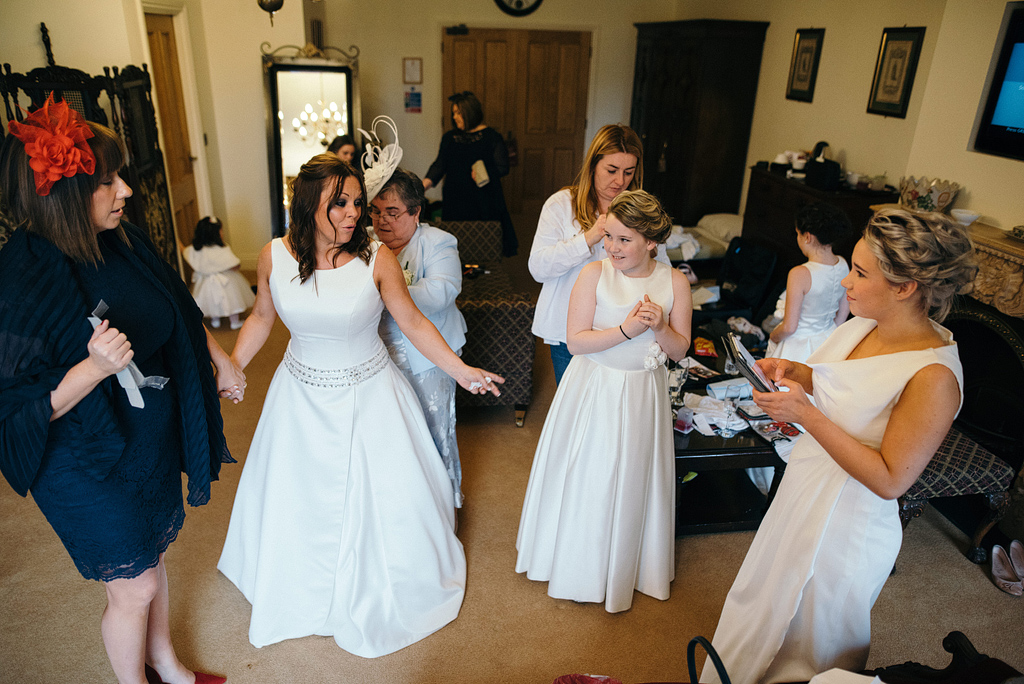 Bridal party in suite preparing for wedding to begin