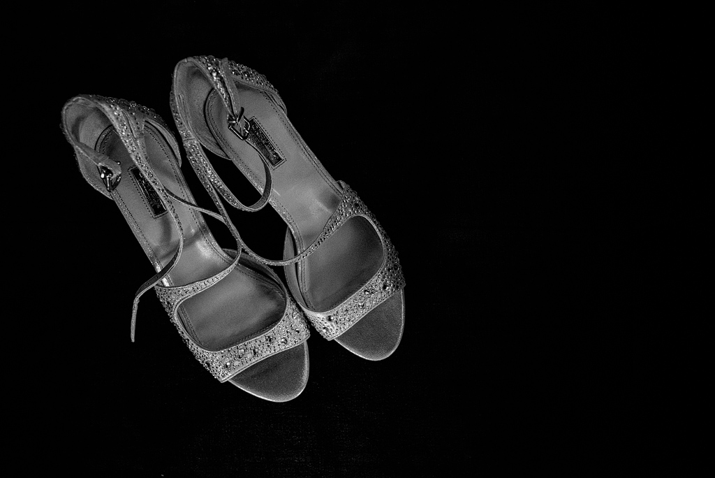 Bride's empty wedding shoes