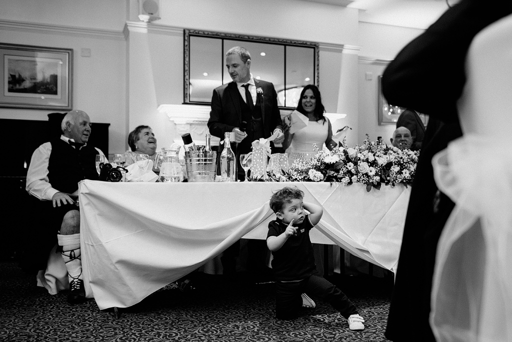 child under top table orsett hall wedding